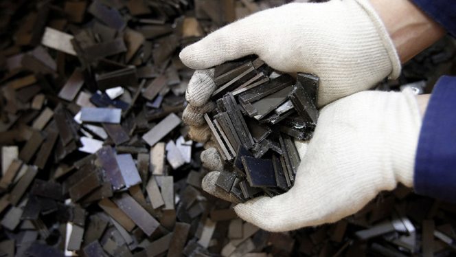 
 Rare earth magnets, recovered from the magnetic rotors of discarded compressors, are displayed for a photograph at Hitachi Plant Technologies Ltd.'s Matsudo research laboratory in Matsudo City, Chiba Prefecture, Japan, on Monday, Dec. 6, 2010. Hitachi Ltd. said it developed machinery to harvest rare earth metals from discarded hard-disk drives and compressors as electronics makers seek to reduce their reliance on Chinese supply. Photographer: Kiyoshi Ota/Bloomberg