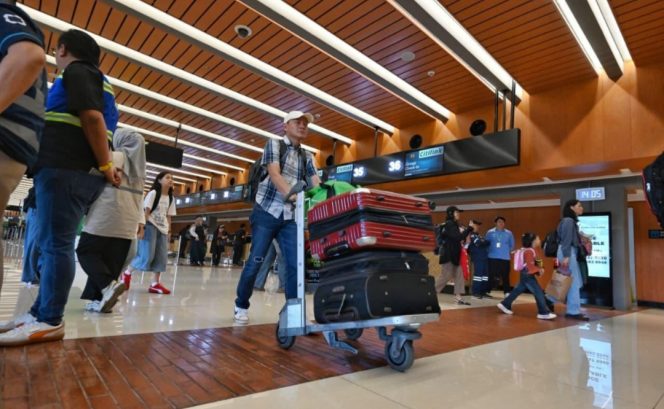 
 Traveler di Bandara