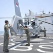 Pilot helikopter AS565 Panther Kapten Laut (P) Andi Quita Wetuffahati (kanan), dari Skuadron 400 Wing Udara 1 Pusat Penerbangan TNI Angkatan Laut (Puspenerbal), didampingi kopilot Letnan Dua Laut (P) Bima Demarta (kiri), memeriksa kondisi helikopter setelah mendarat di geladak KRI Prabu Siliwangi-321 yang berlayar di perairan Bangka, Rabu (16/9/2026).